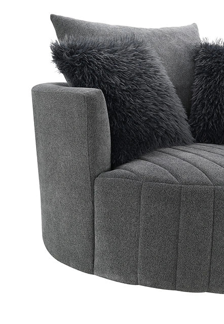 Sillón giratorio Hoople con canal tapizado en capitoné