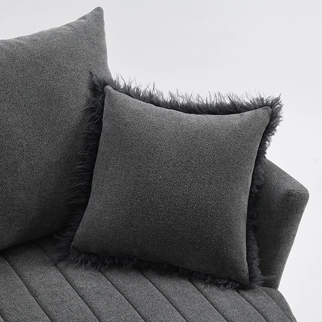 Sillón giratorio Hoople con canal tapizado en capitoné