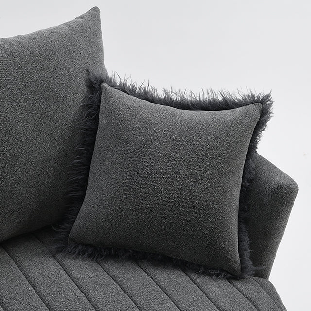 Sillón giratorio Hoople con canal tapizado en capitoné