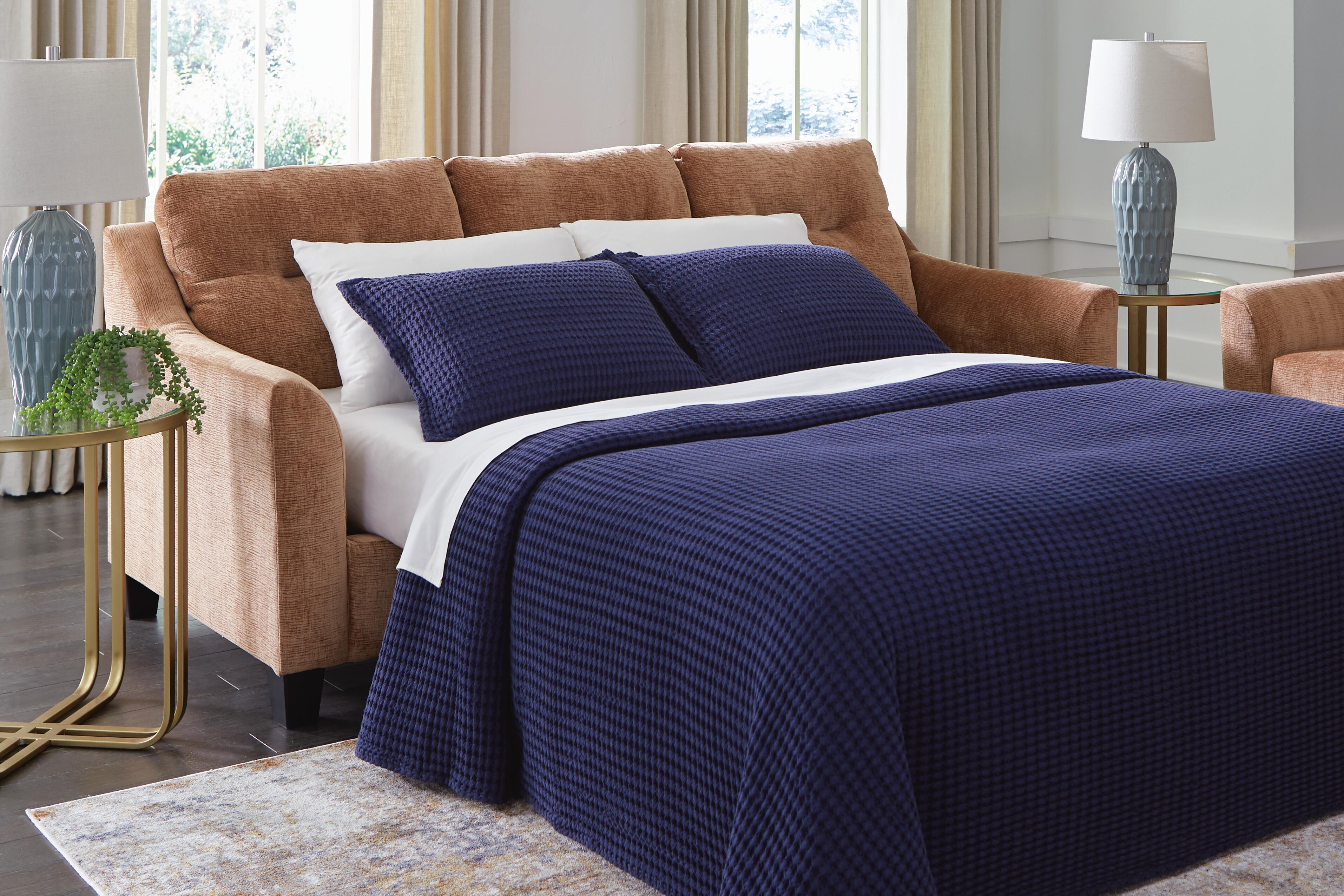 Sofá seccional con chaise y sofá cama Amity Bay