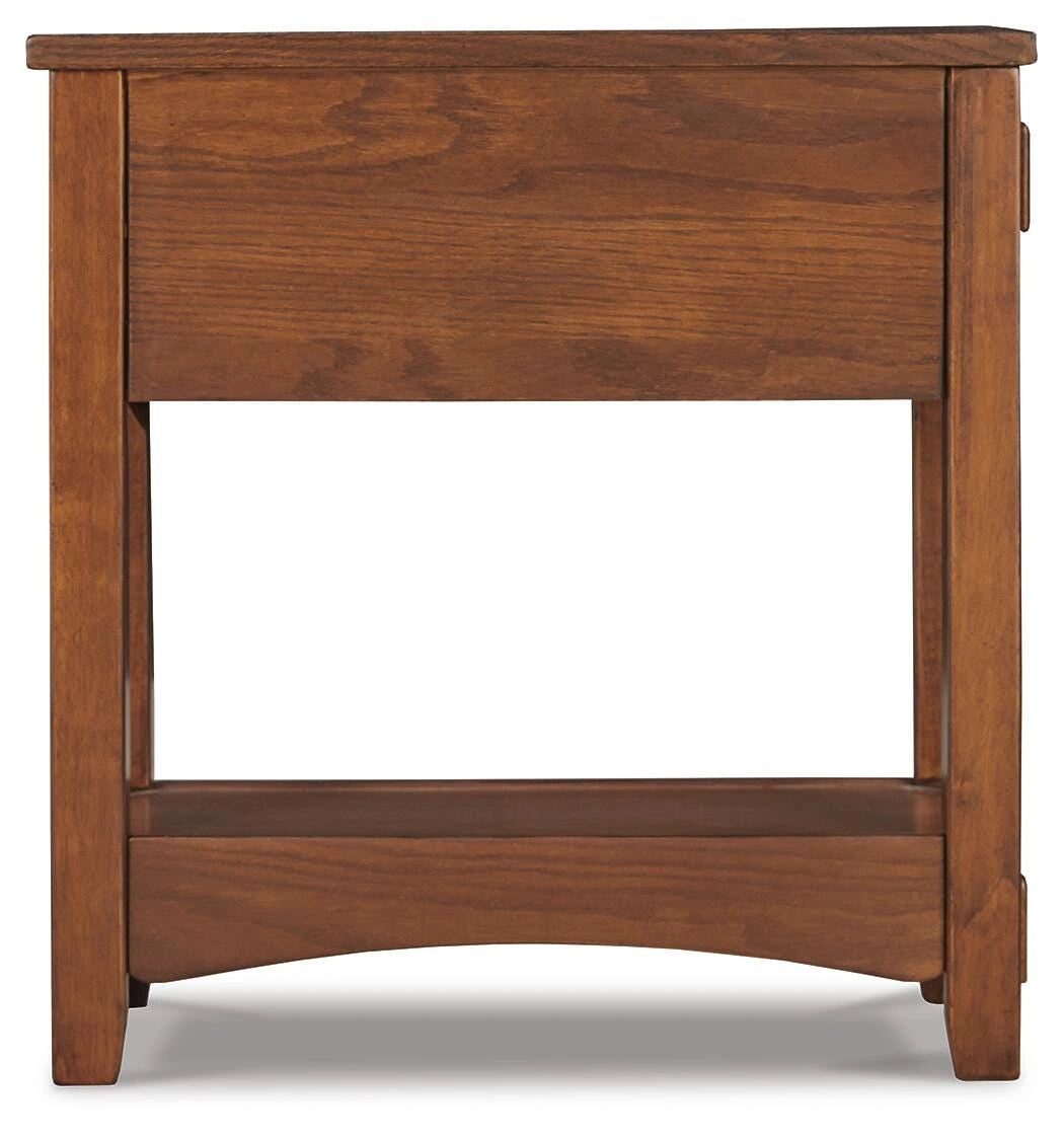 Mesa auxiliar Breegin junto al sillón