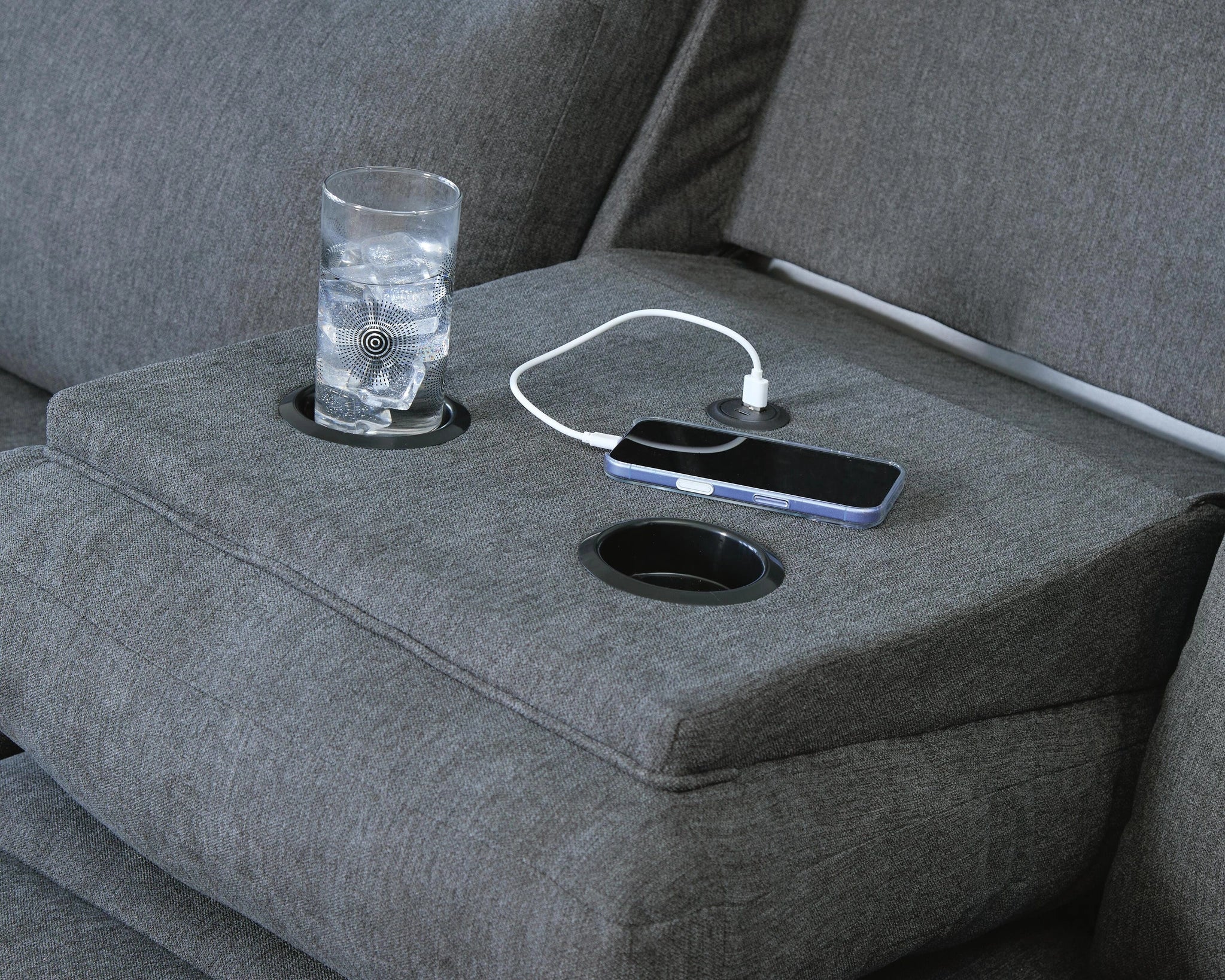 Sofá reclinable de desplazamiento lateral con mesa abatible