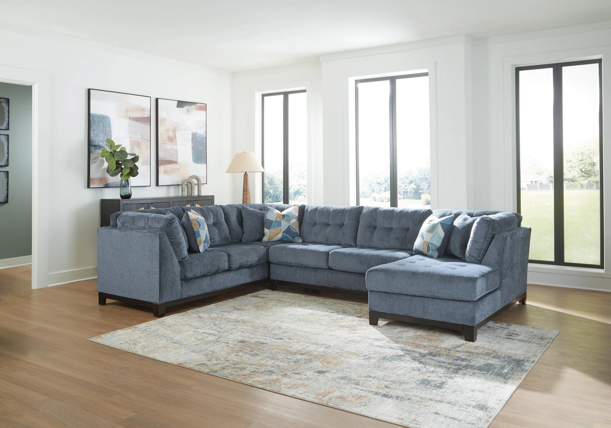 Sofá seccional Maxon Place con chaise longue